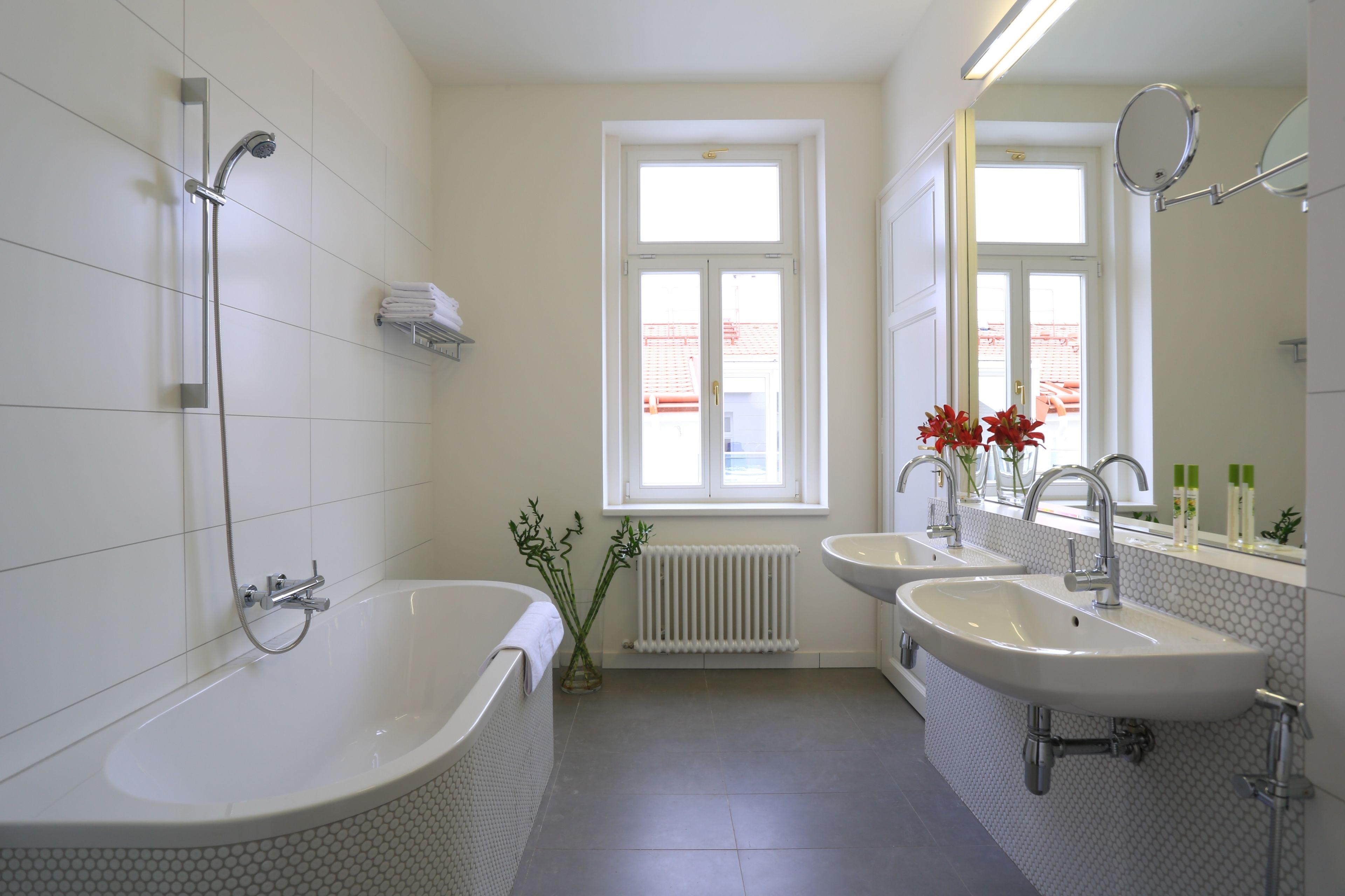 designer toiletries, hair dryer, towels