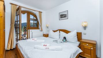 Family Apartment, Patio, Mountain View (Balcony) | Individually decorated, individually furnished, blackout drapes