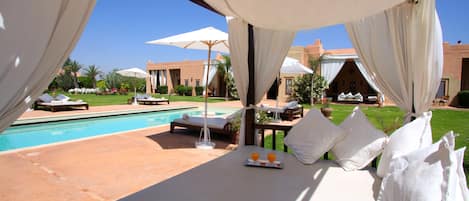 Outdoor pool, pool umbrellas, pool loungers