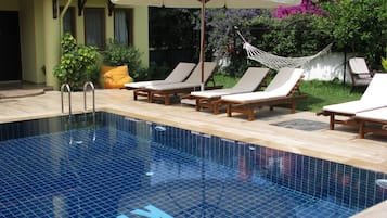 Seasonal outdoor pool, pool umbrellas, pool loungers
