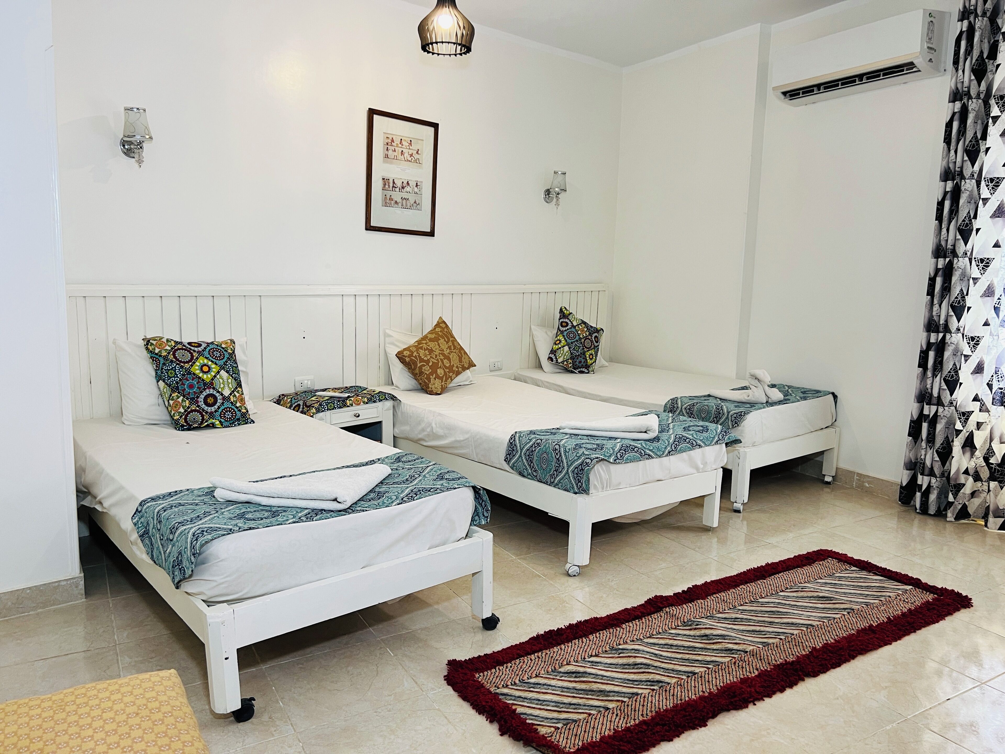 Deluxe Triple Room, Garden View | Premium bedding, desk, rollaway beds, free WiFi