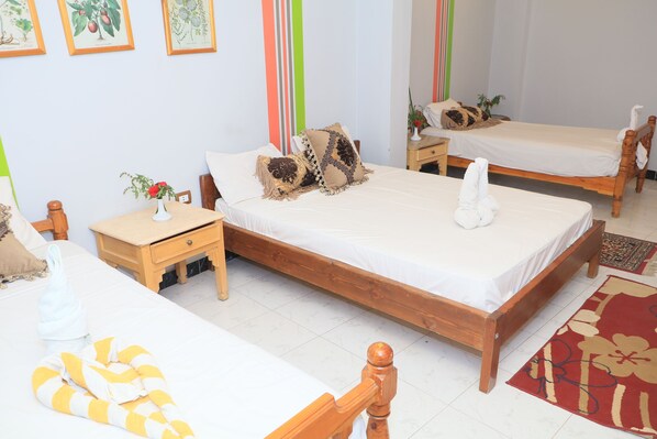 Room (Deluxe Family Room, Garden View) | Premium bedding, desk, rollaway beds, free WiFi