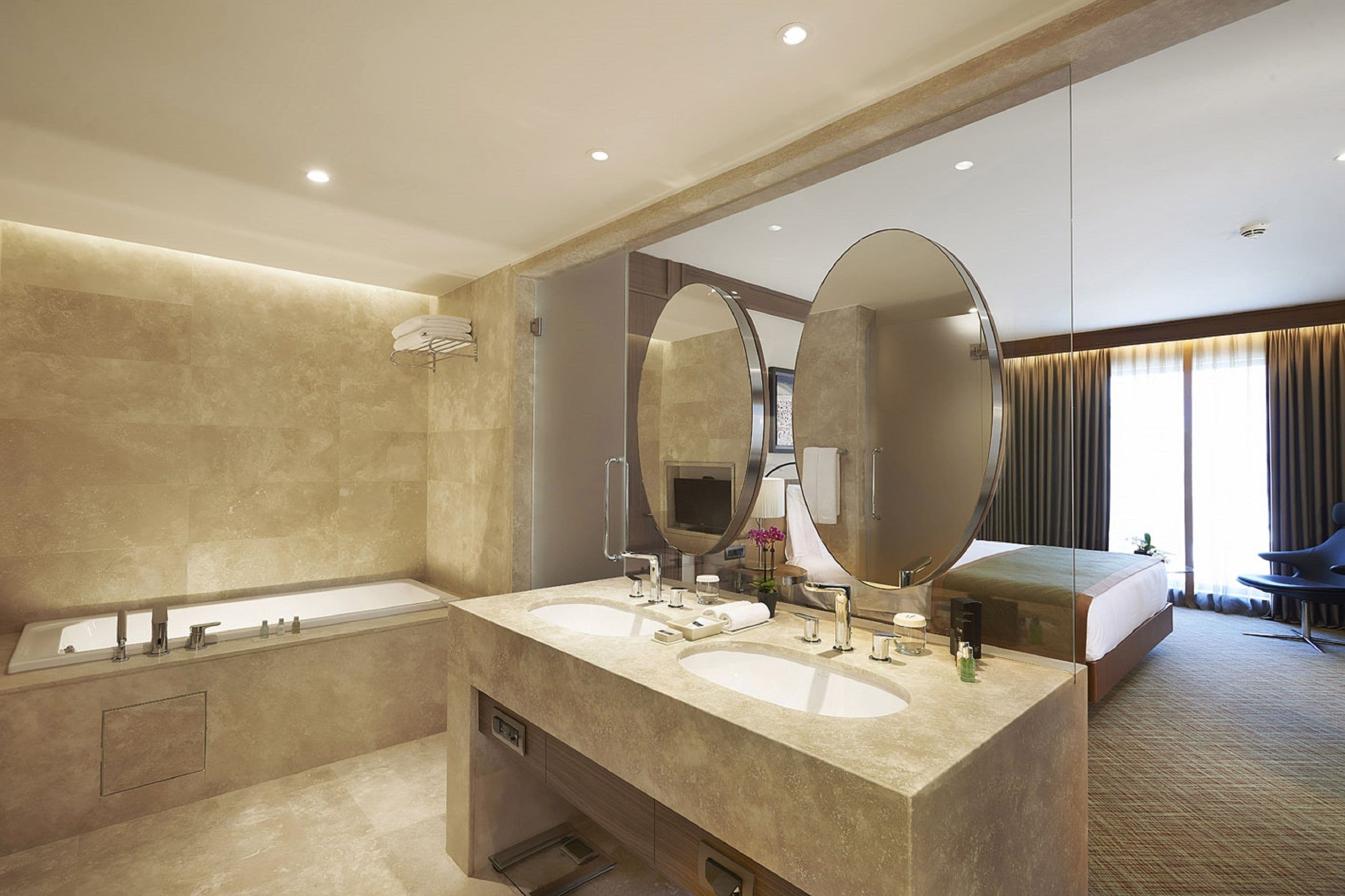 business suite | bathroom | shower, eco-friendly toiletries, hair dryer, bathrobes