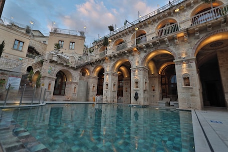 Outdoor pool. Elika Cave Suites Cappadocia, Curio Collection by Hilton