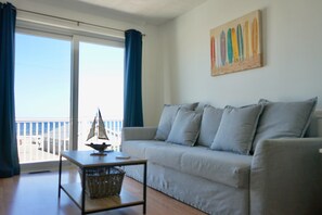 Shore Line Suite, 1 Queen Bed and Futon, 2 Private Balconies, Kitchenette | Living room | TV