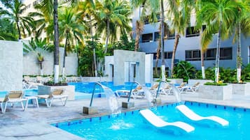 Outdoor pool, free cabanas, pool umbrellas