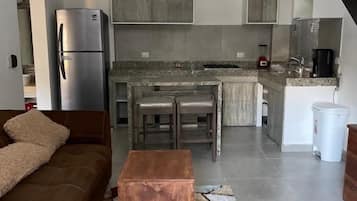 Deluxe Apartment | Private kitchen | Fridge, microwave, stovetop, coffee/tea maker