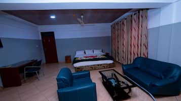 City Suite, 1 King Bed, City View | In-room safe, desk, free WiFi