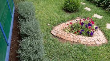 Double Room, Garden View | In-room safe, desk, iron/ironing board, free WiFi