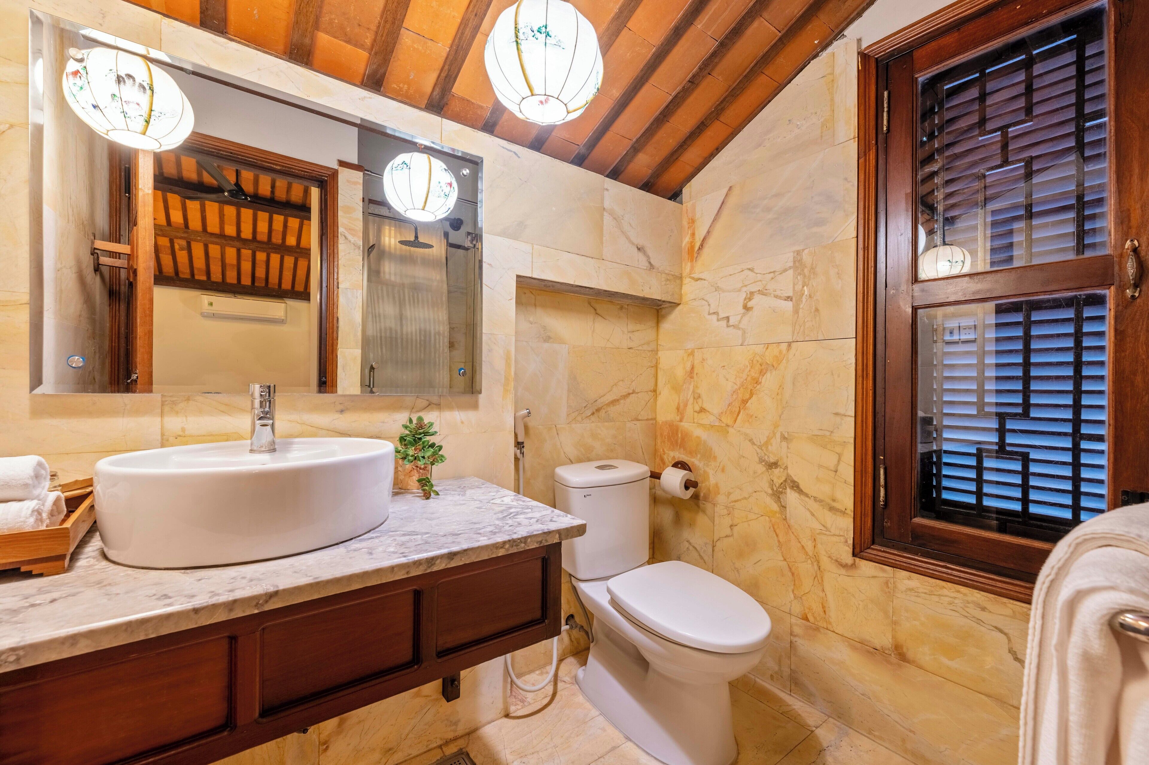 superior triple room | bathroom | shower, free toiletries, bathrobes, towels