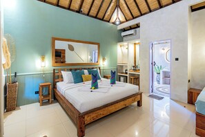 Bungalow Deluxe, vista a la alberca | Detalle interior