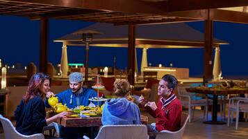 Breakfast, lunch, dinner served; international cuisine, garden views