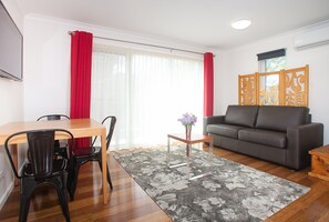 Living area - One of a Kind Apartments (Dickson)