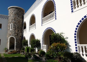A building with multiple arched windows and a central tower.