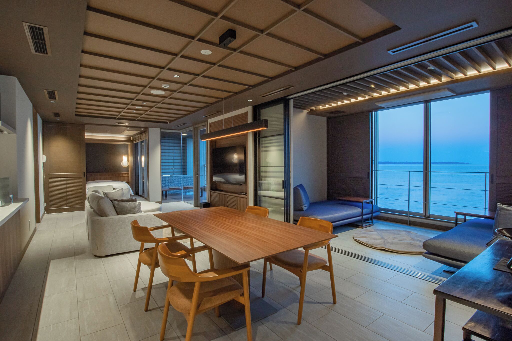 type d2 deluxe resort, non smoking | living area | flat-screen tv