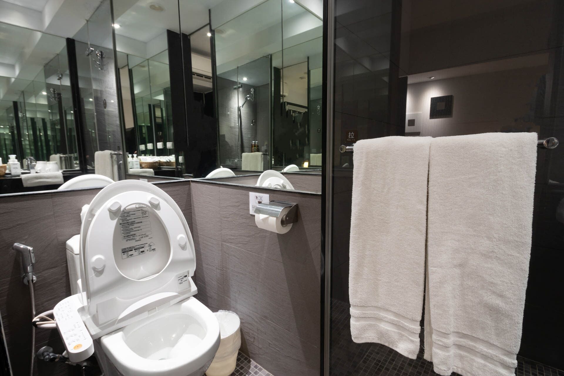 standard double room, no windows | bathroom | shower, hair dryer, slippers, towels