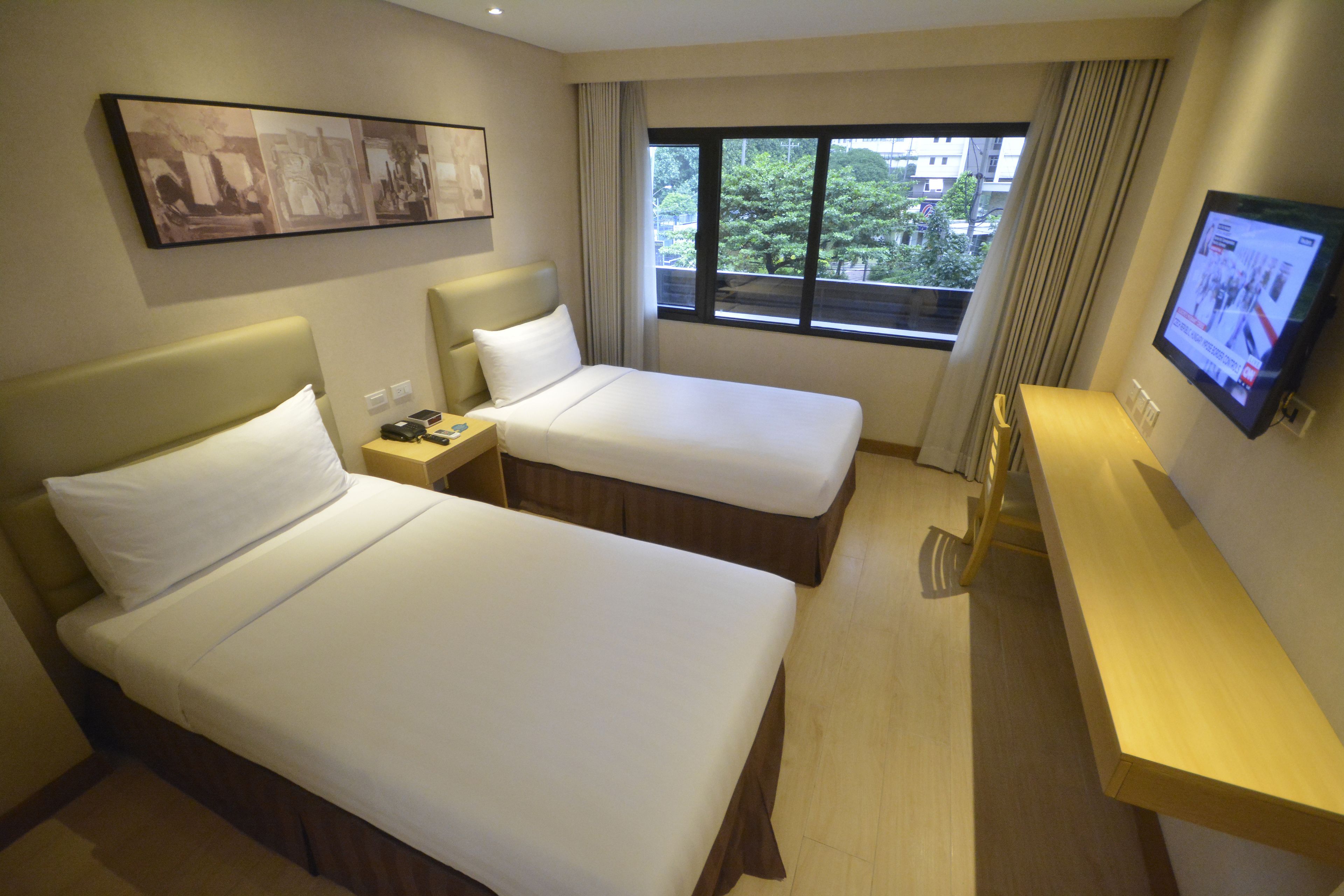 business twin room | minibar, in-room safe, desk, laptop workspace