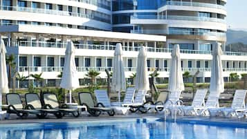 Indoor pool, 2 outdoor pools, open 7:00 AM to 6:00 PM, pool umbrellas