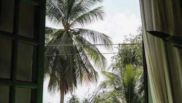 Deluxe Double or Twin Room, River View | Minibar, in-room safe, desk, free WiFi