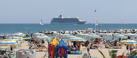 On the beach, white sand, 2 beach bars