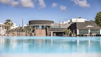 Outdoor pool, open 10:00 AM to 6:00 PM, pool umbrellas, sun loungers