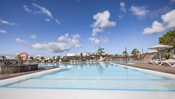 Outdoor pool, open 10:00 AM to 6:00 PM, pool umbrellas, pool loungers