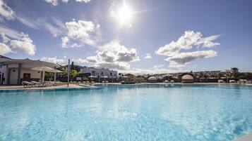 Outdoor pool, open 10:00 AM to 6:00 PM, pool umbrellas, sun loungers