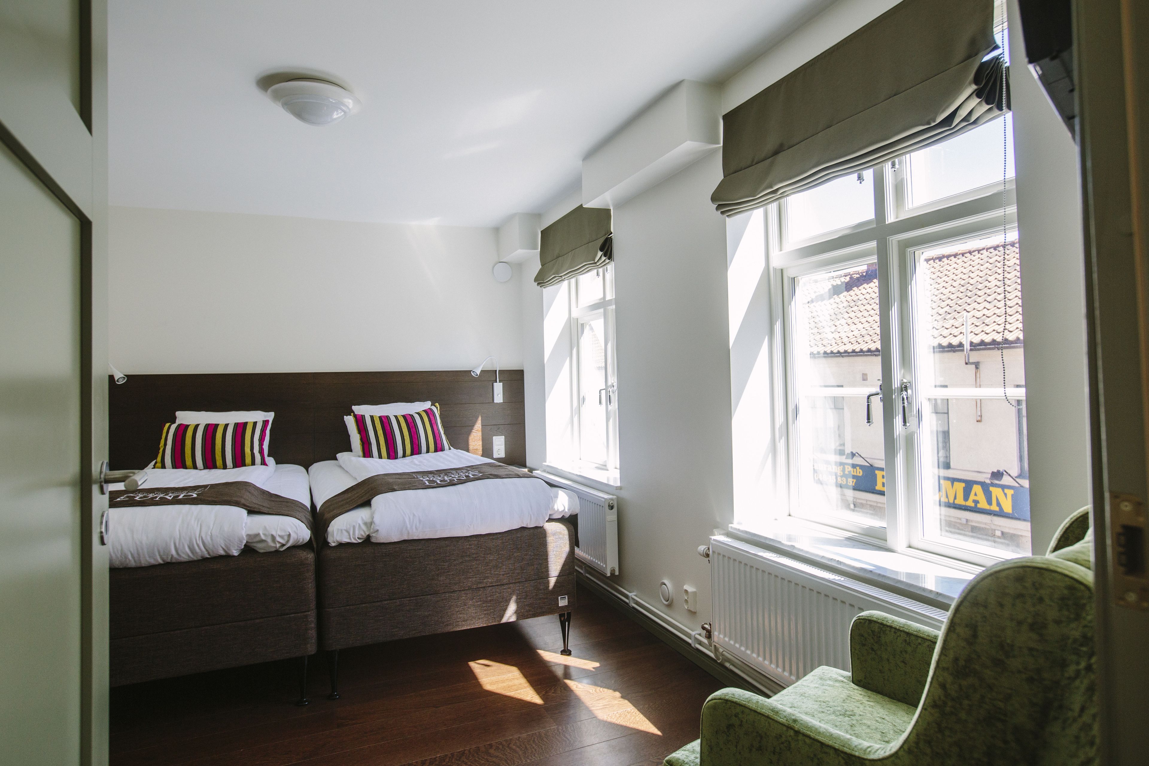 family room | 1 bedroom, in-room safe, desk, iron/ironing board