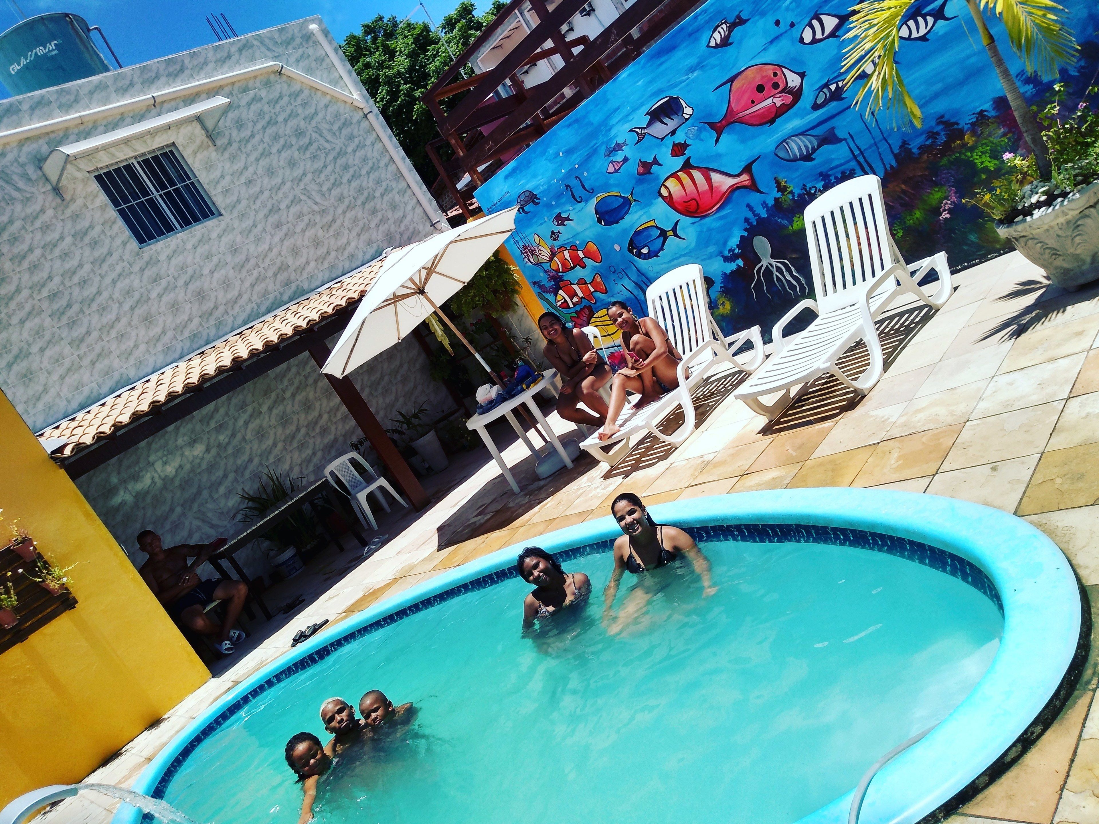 Outdoor pool, pool umbrellas, pool loungers