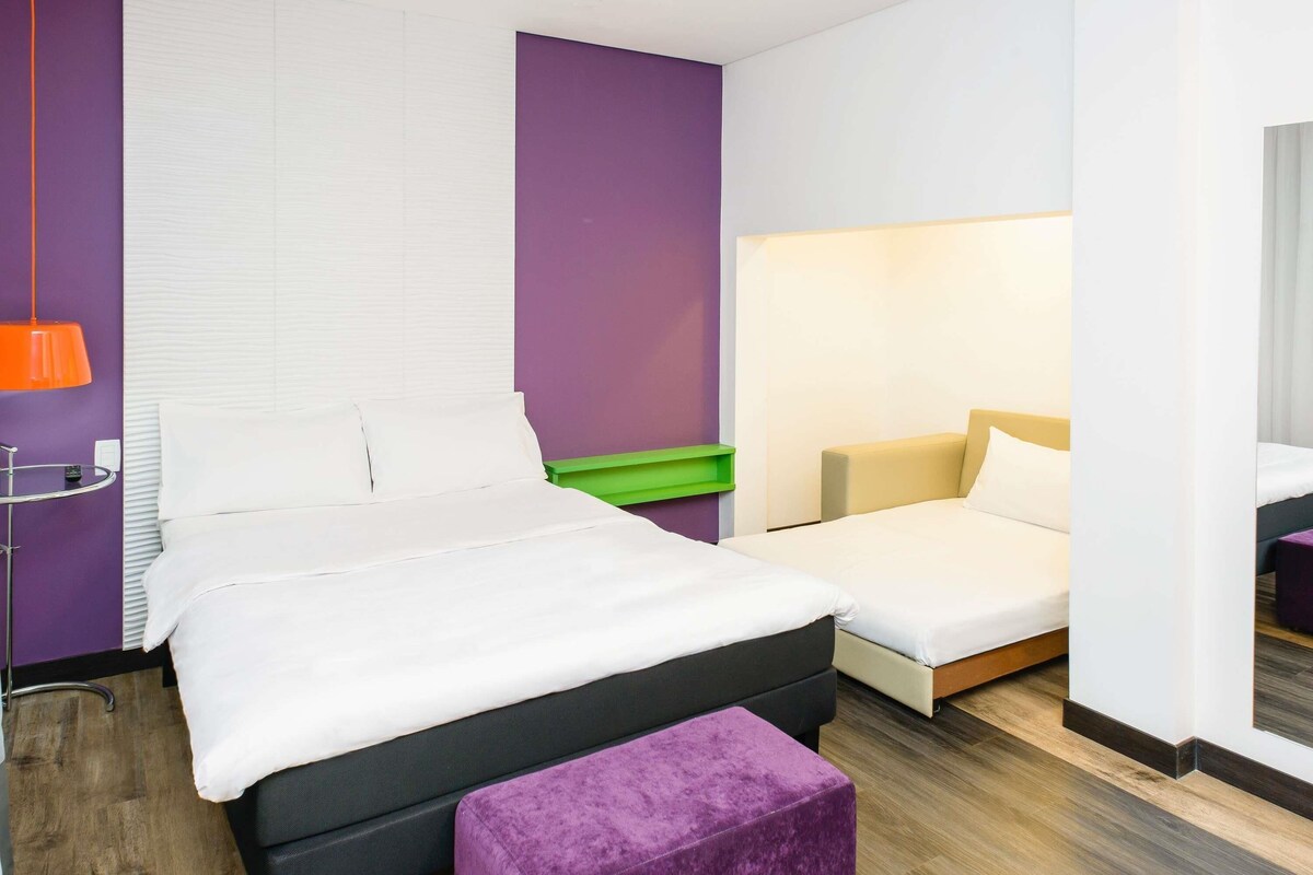 Apartamento standard, 1 cama de casal e sofá-cama | Frigobar, cofres nos quartos, escrivaninha, quartos à prova de som