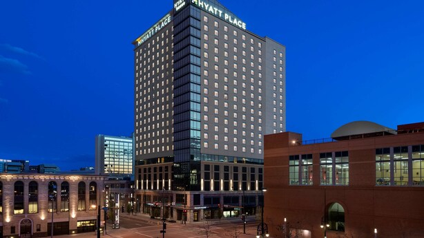 A multi-story hotel with a prominent "Hyatt Place" sign, large windows, and a modern architectural design. - Hyatt Place Denver Downtown (Denver)