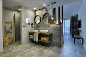A modern bathroom with a wooden vanity, two sinks, a towel rack, and a mirror. - Grifid Hotel Vistamar - Ultra All Inclusive (Golden Sands)