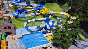 Indoor pool, 2 outdoor pools, open 9:00 AM to 6:00 PM, pool umbrellas