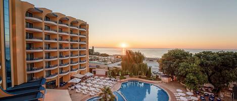 Indoor pool, 2 outdoor pools, open 9:00 AM to 6:00 PM, pool umbrellas