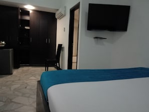 Habitación Premier | Minibar, caja de seguridad en la habitación y cunas gratuitas