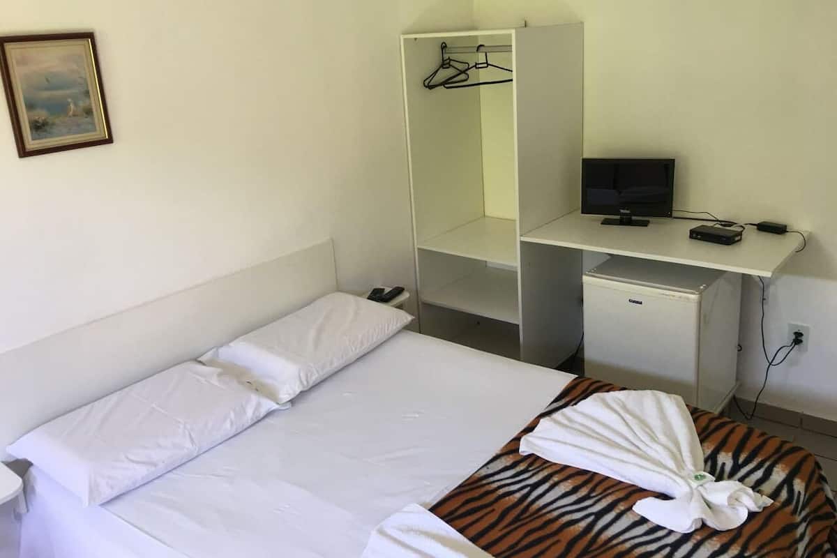 Minibar, iron/ironing board (on request), WiFi (free), bed sheets