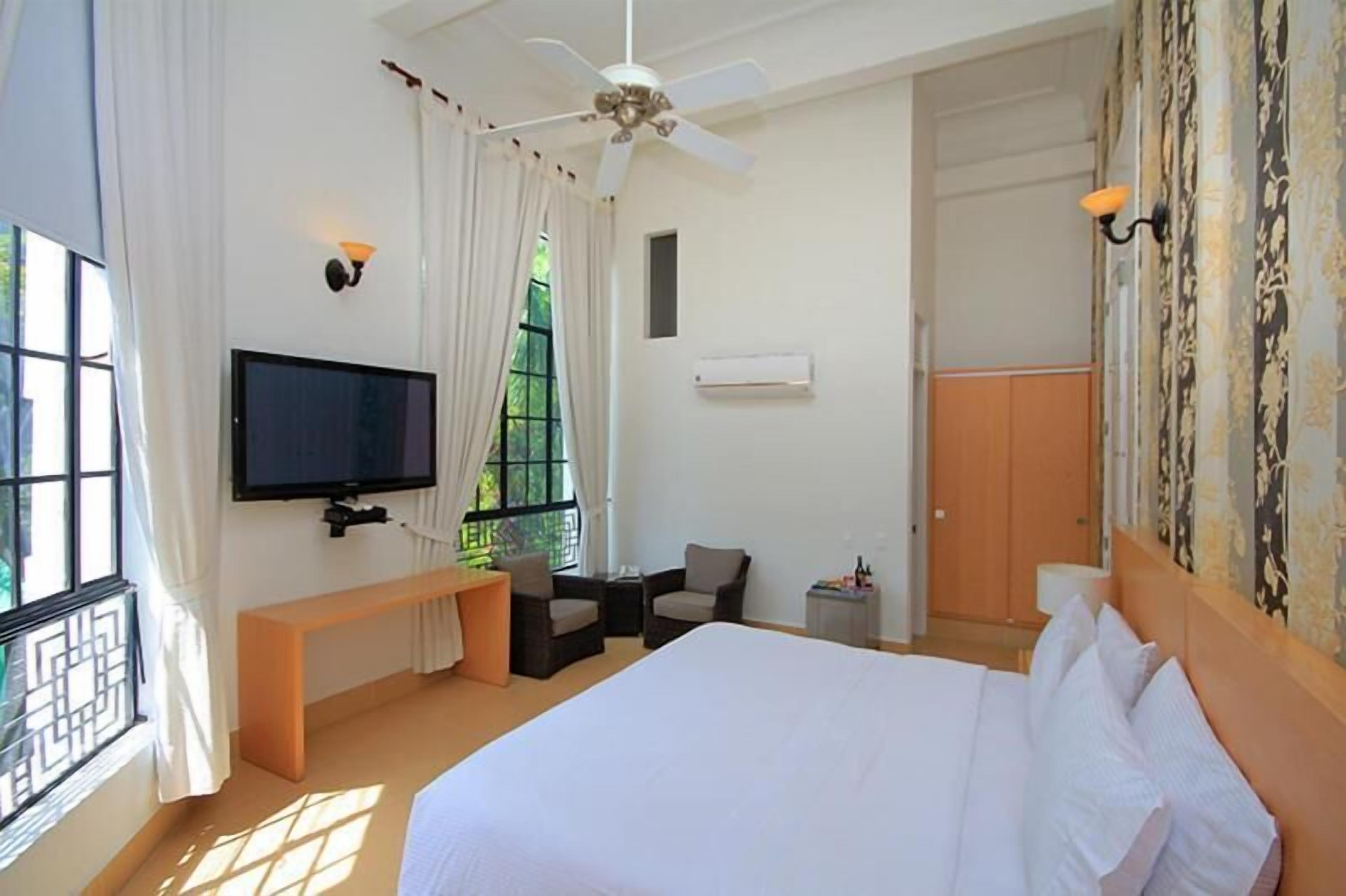 Pillow-top beds, desk, blackout curtains, wheelchair access