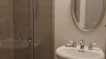 Premium Suite, 2 Bedrooms, Garden View | Bathroom | Free toiletries, hair dryer, towels