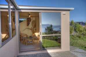 Habitación Confort, 1 habitación, vista al océano | Terraza o patio