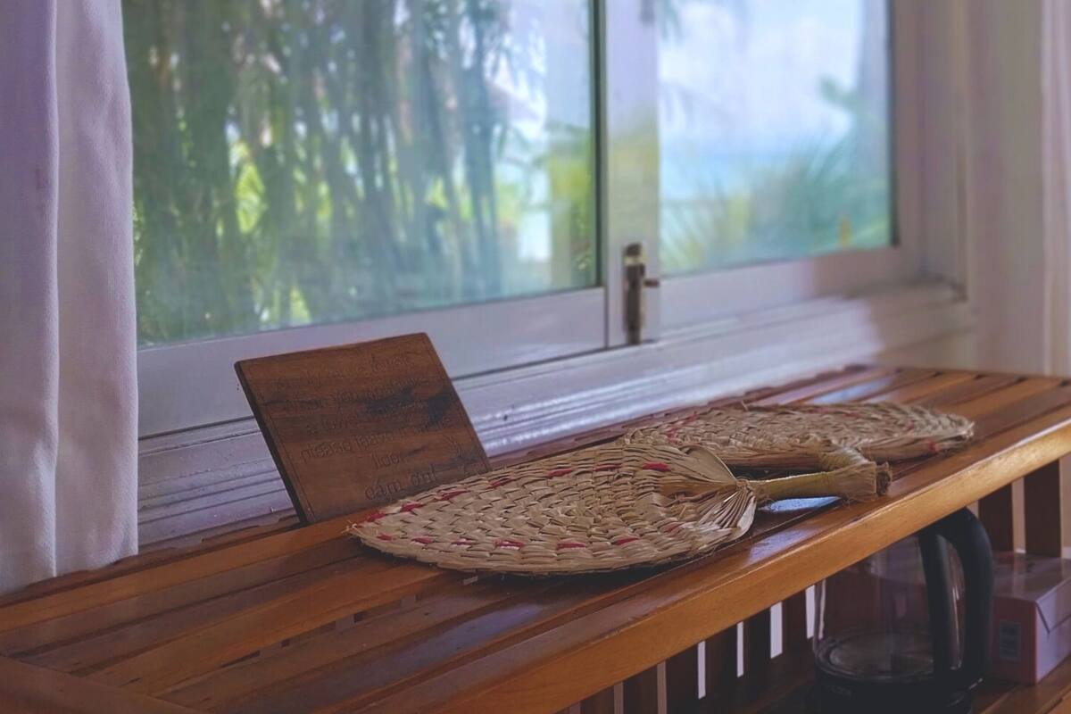 Room, Sea View | Minibar (some free items), in-room safe, desk, iron/ironing board