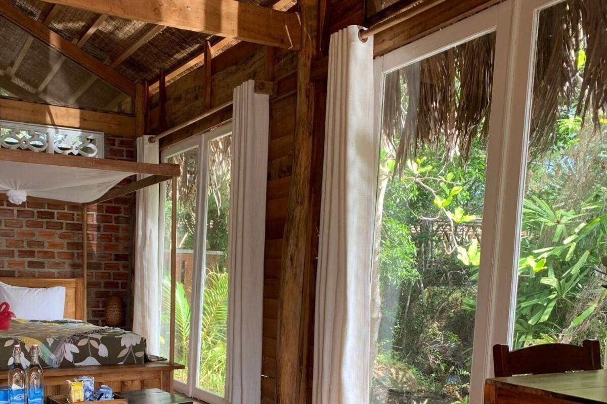 House, River View | Minibar (some free items), in-room safe, desk, iron/ironing board