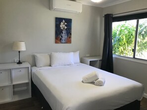 Deluxe Villa | Blackout drapes, bed sheets - Bush Village Holiday Cabins (Cannonvale)