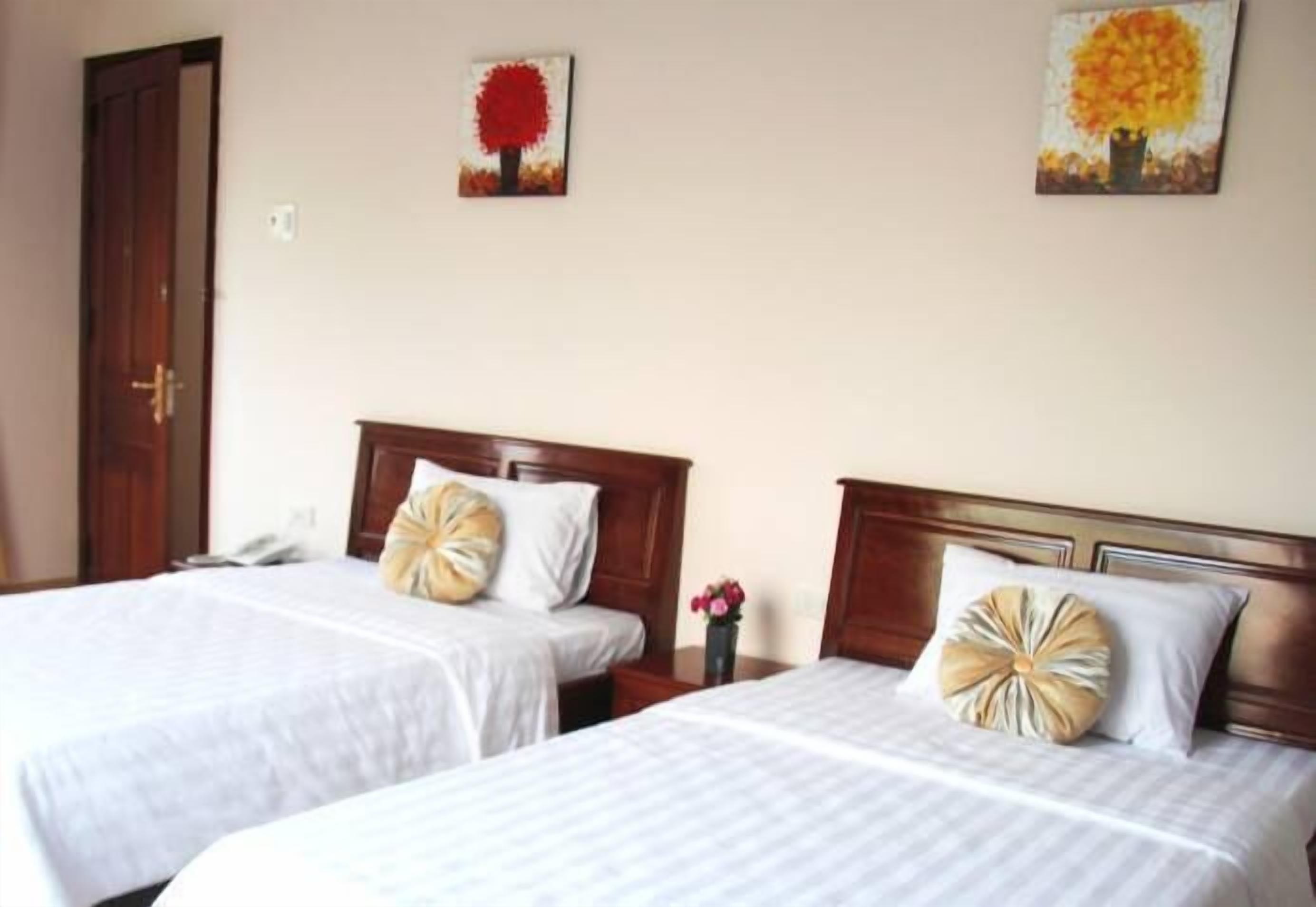 deluxe room, 2 single beds, city view | premium bedding, minibar, in-room safe, desk