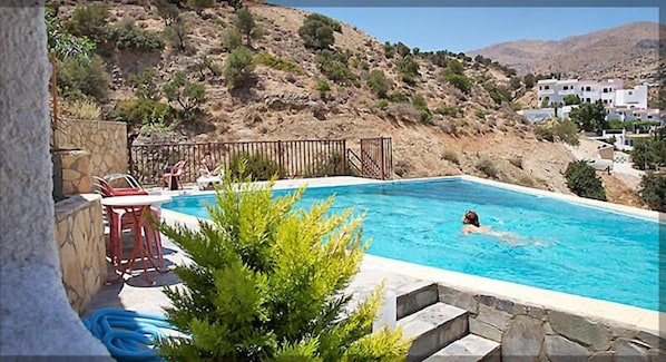 Seasonal outdoor pool, pool umbrellas, sun loungers