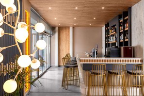 2 bars/lounges, poolside bar, beach bar