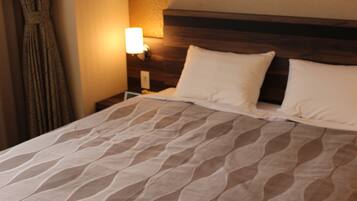 Blackout drapes, iron/ironing board, free WiFi, bed sheets