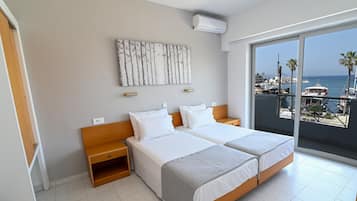 Apartment, 1 Bedroom, Harbor View | 1 bedroom, in-room safe, blackout drapes, soundproofing