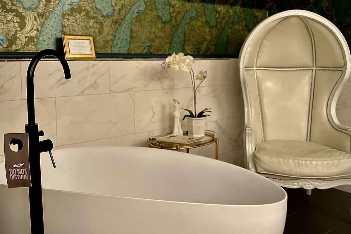 design room, partial lake view | 1 bedroom, individually decorated, individually furnished