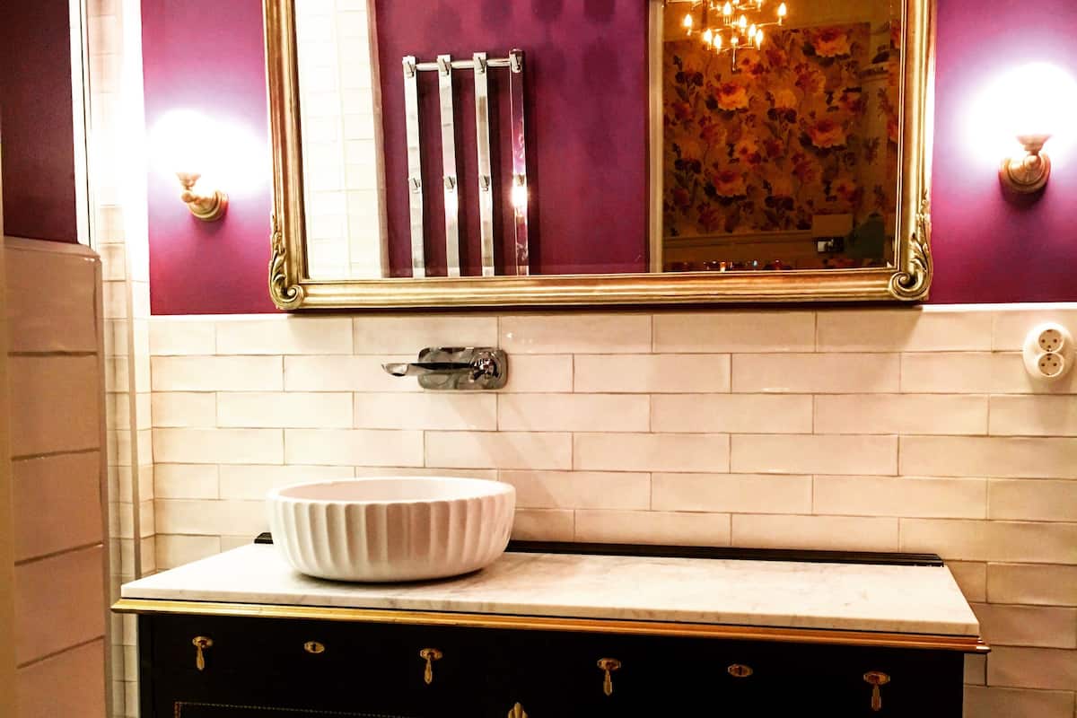 superior double room, partial lake view | bathroom | hair dryer, towels