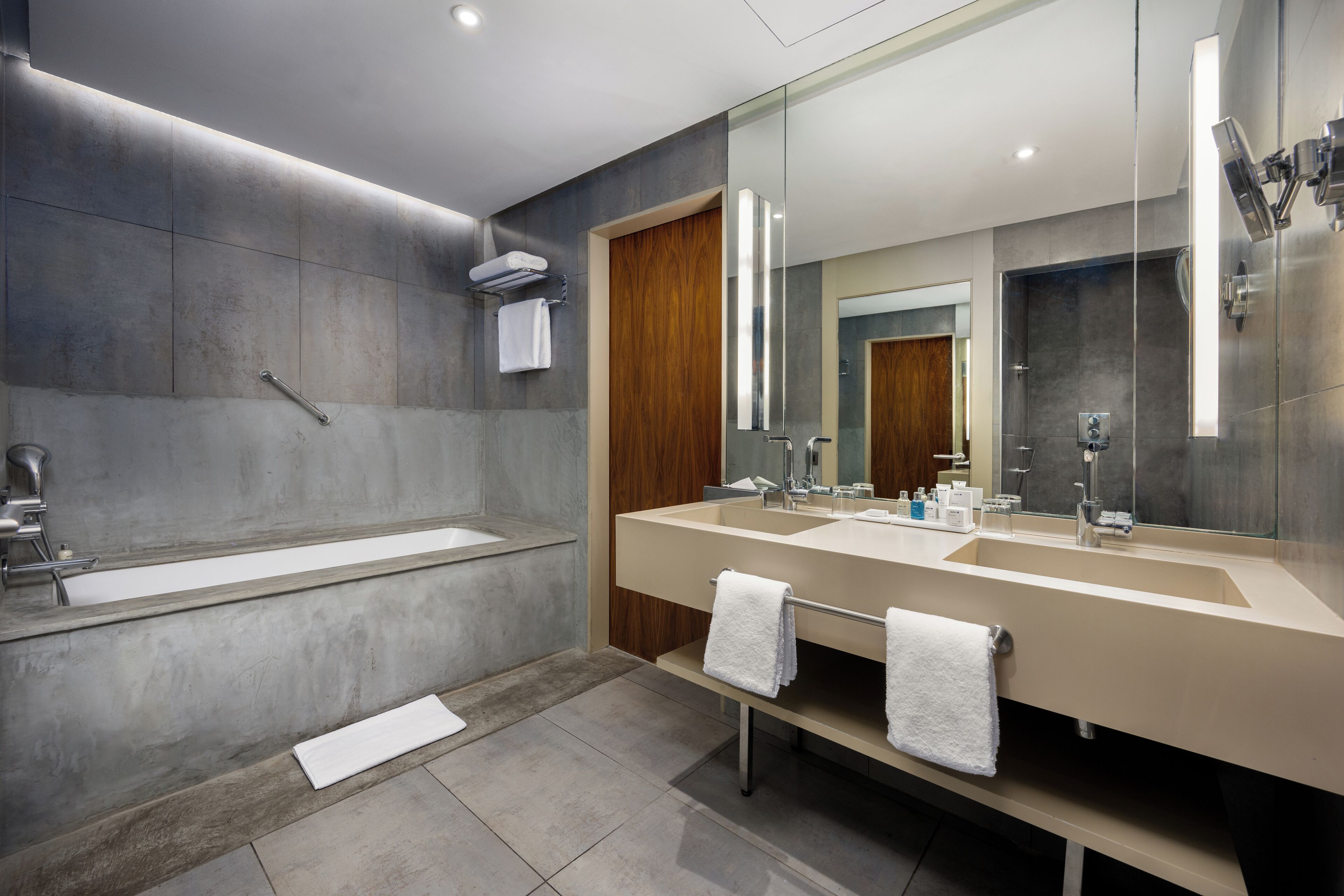 designer toiletries, hair dryer, bathrobes, bidet